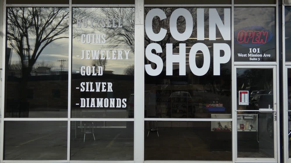 Gold and silver bullion bars and coins displayed at Gold & Silver Trading Post in Bellevue, Nebraska